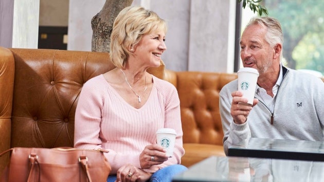 Expérience Client - Hotel avec We Proudly Serve Starbucks